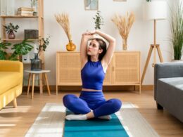 Woman doing workout in living room at home.