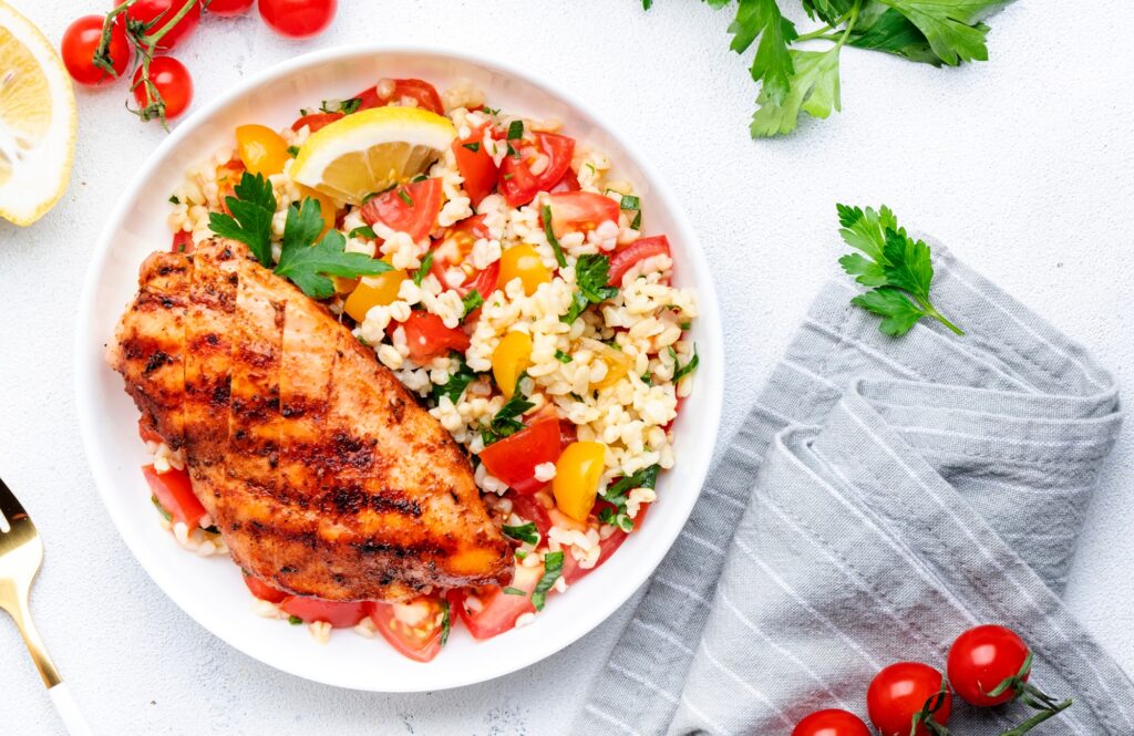 Grilled chicken breast fillet with tabbouleh salad with bulgur, tomato and parsley