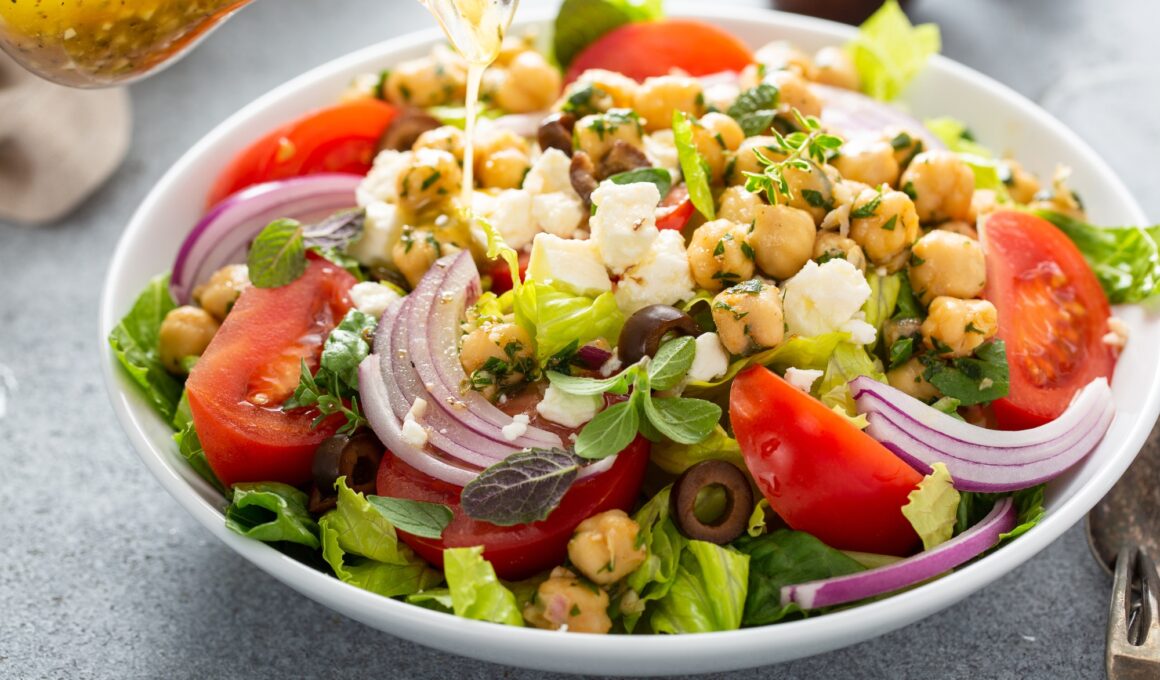 Healthy spring Greek salad with fresh vegetables and chickpeas